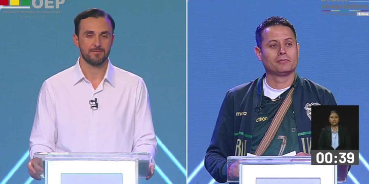 Juan Pablo Velasco, de Libre (izq), y Edmand Lara, del PDC (der). 