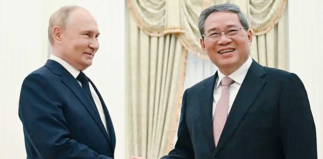 Vladímir Putin y Li Qiang. Foto: Agencias