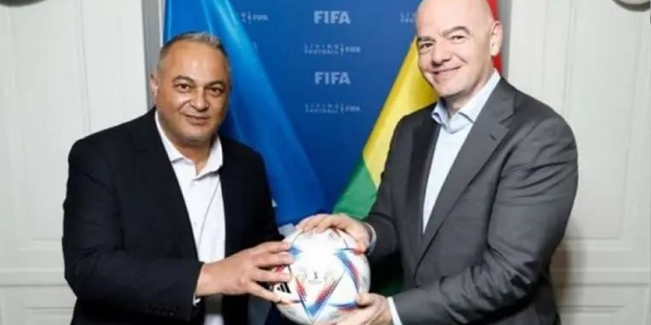 Fernando Costa y Gianni Infantino en un encuentro pasado.